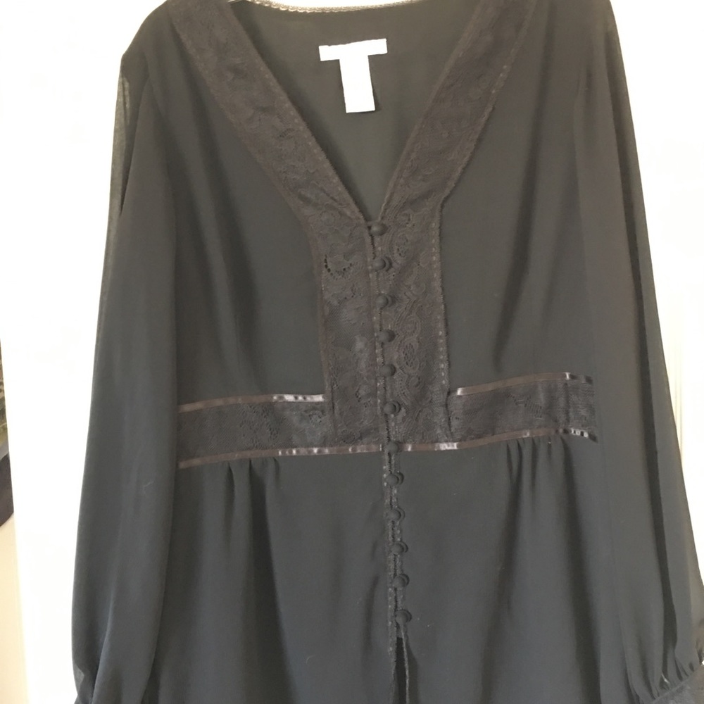Long sleeve black blouse.